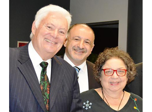 Former Trustee James Schoolmaster and Trustee Hussein Berry with former Trustee Pamela Adams, ca. 2014.