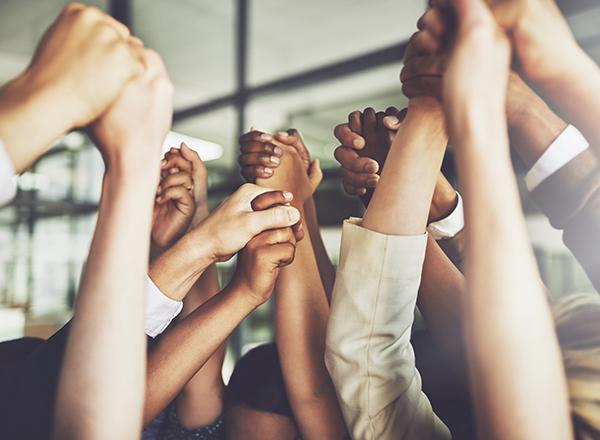 Hands clasped in support