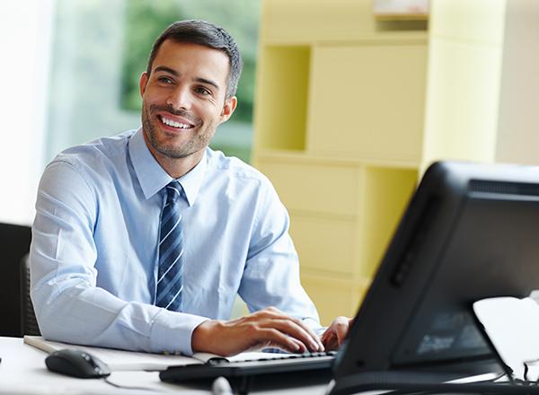 business student at computer