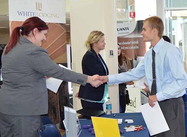 Two people shaking hands