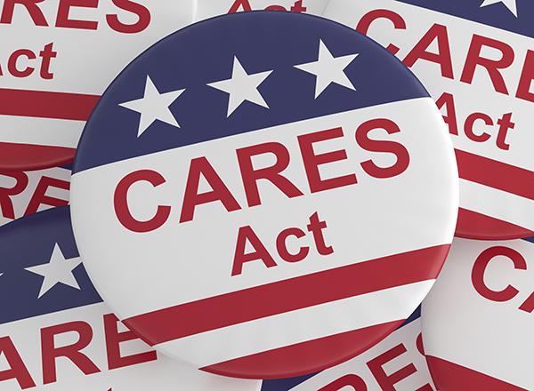 Lapel buttons with white stars on blue field, red/white stripes and CARES Act text