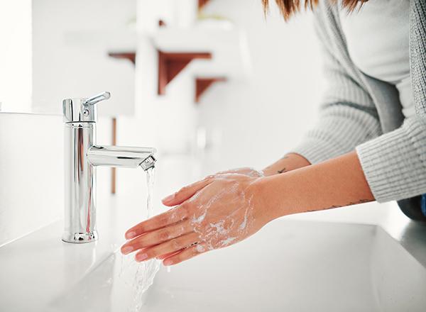 Woman washing hands
