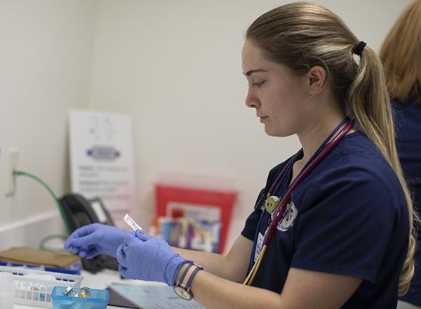 HFC nursing student preparing for patient care