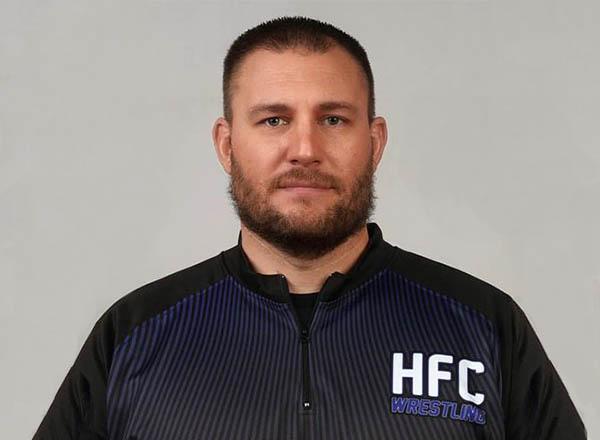 A headshot of Joshua Priebe.