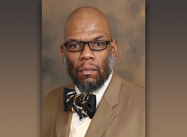 A headshot of  Dr. Kalvin DaRonne Harvell.