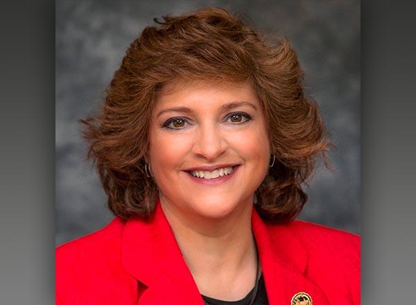 A headshot of Leslie Herrick.