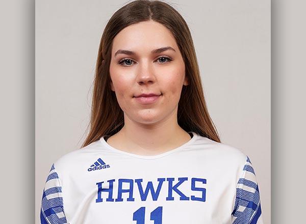 A headshot of Madison Candela.