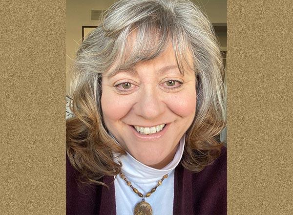 A headshot of Patricia Lanzon.