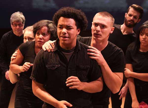 HFC students acting on stage together.