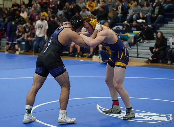 An HFC wrestler squares off with his opponent. 