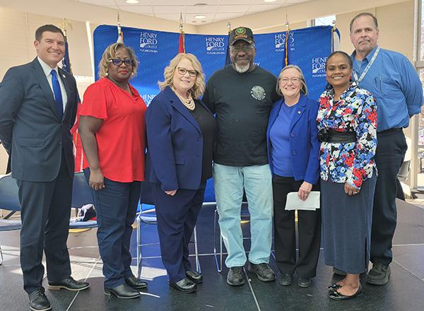Group shot of various HFC leaders and Ed Stokes