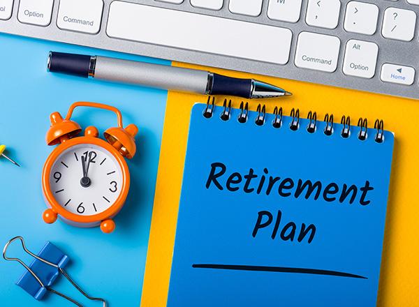 Retirement plan - reminder of the need for savings on a desk.