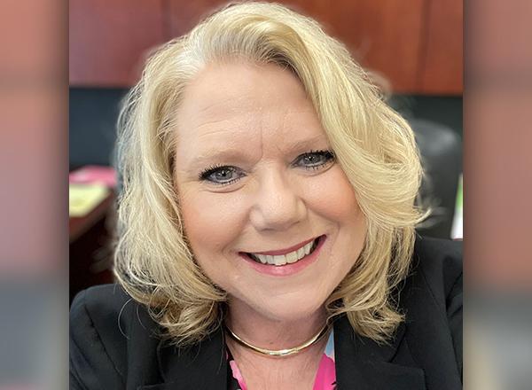 A headshot of Holly Diamond.