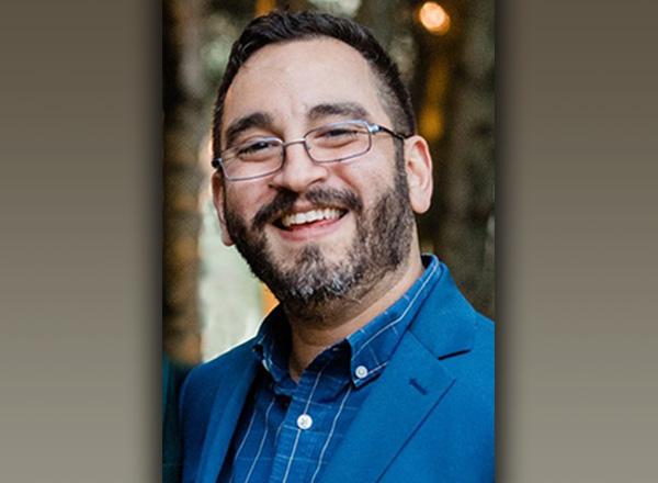 A headshot of Israel Perez.