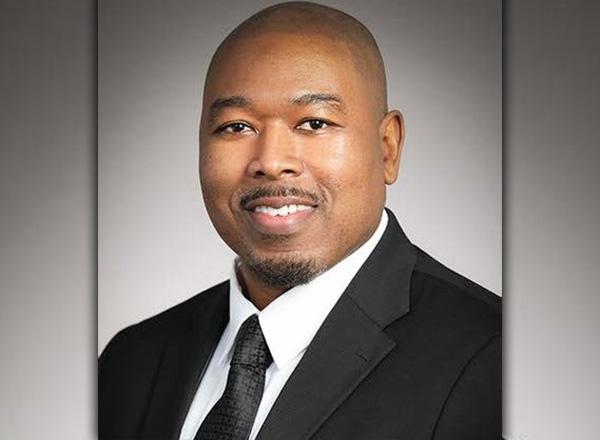 Headshot of Dr. Akil Houston.