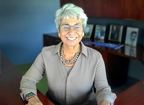 Dr. Cristina Bailey at her desk.