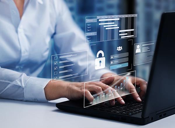  Internet networking protection security system concept. Padlock icon on tech code background while person is working on laptop.. 