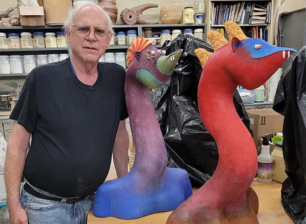 Steve Glazer standing next to his Griots.