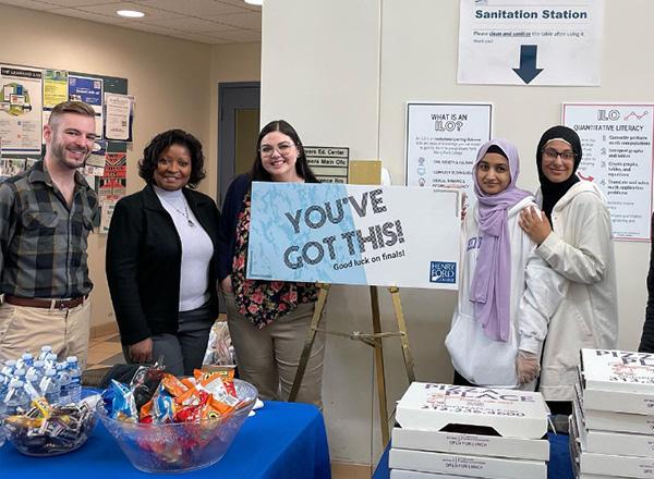 Volunteers working Good Luck on Finals event.