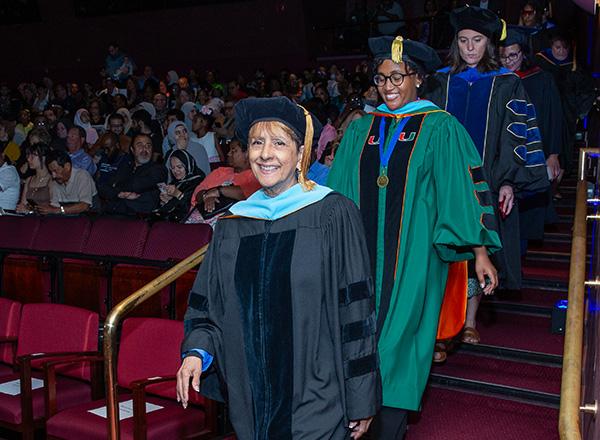 Faculty leading procession into the auditorium.