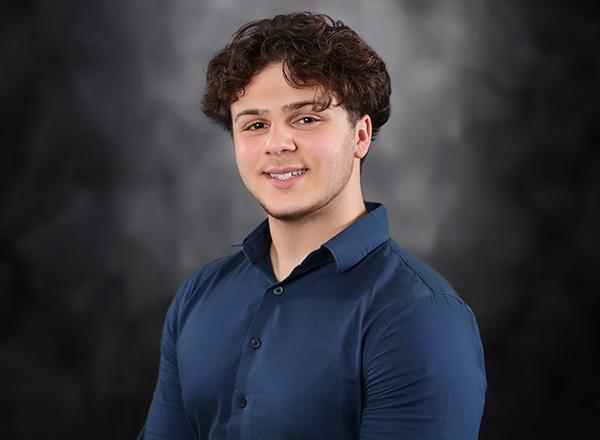 Headshot of Ali Berry.