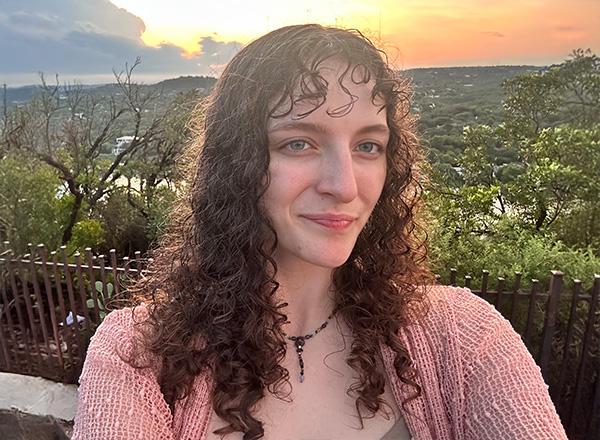 Jadyn Schroeder selfie with a sunset in the background.