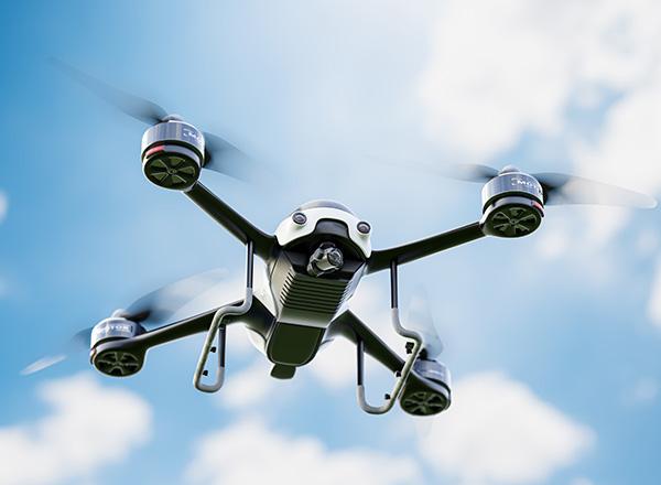 Drone flying close-up taken from below while the sky is clear.