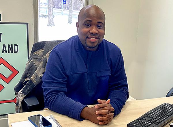 Eddie at his desk in Detroit Promise.