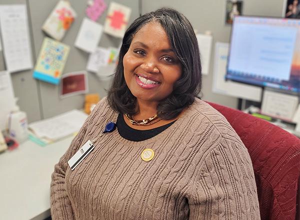 Linda Lance at her desk.