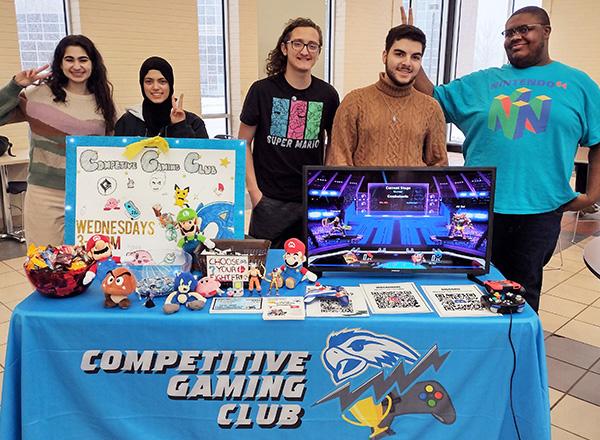 The Gaming Club hanging around with a table set up.