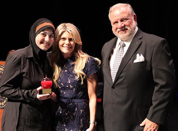 Sarah Kdouh accepting her award.