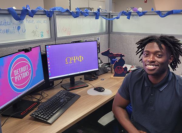 Drew Thomas at his desk