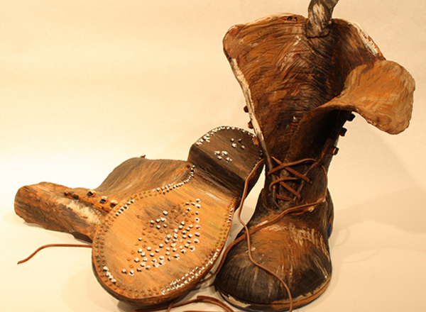HFC student Sophia Hart won first place for her clay sculpture of boots called “A Walk In Vincent’s Shoes” at the 2016 Liberal Arts Network for Development (LAND) Conference this past February. 