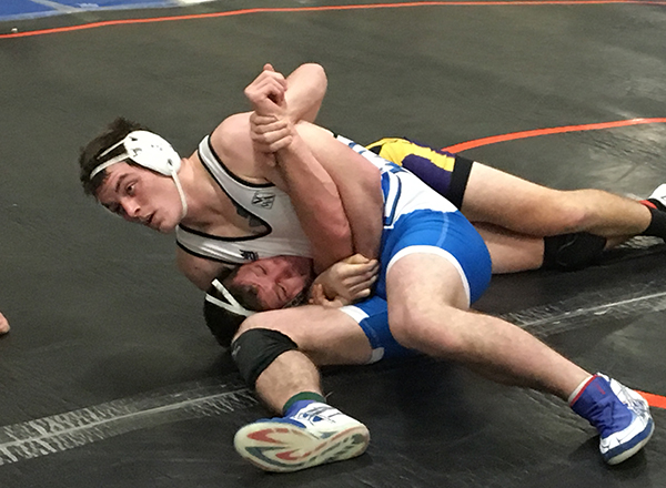 HFC Wrestler John Haggerty puts the squeeze on his opponent!